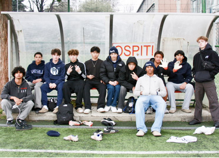 CUBS POSE on the "Ospiti" (visitors) bench at Istituto Sociale Jesuit school before a match